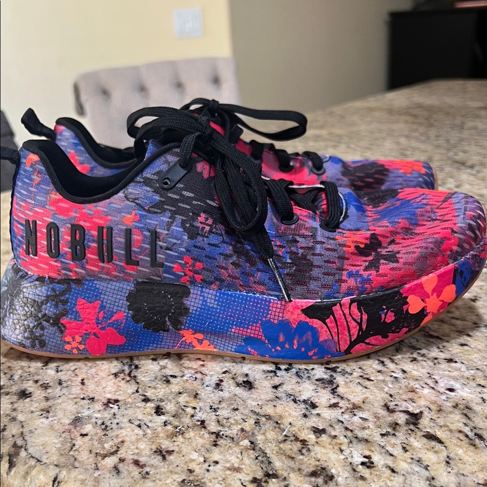 NOBULL  floral trainers, worn one time, like new condition!! Women’s size 10.5.